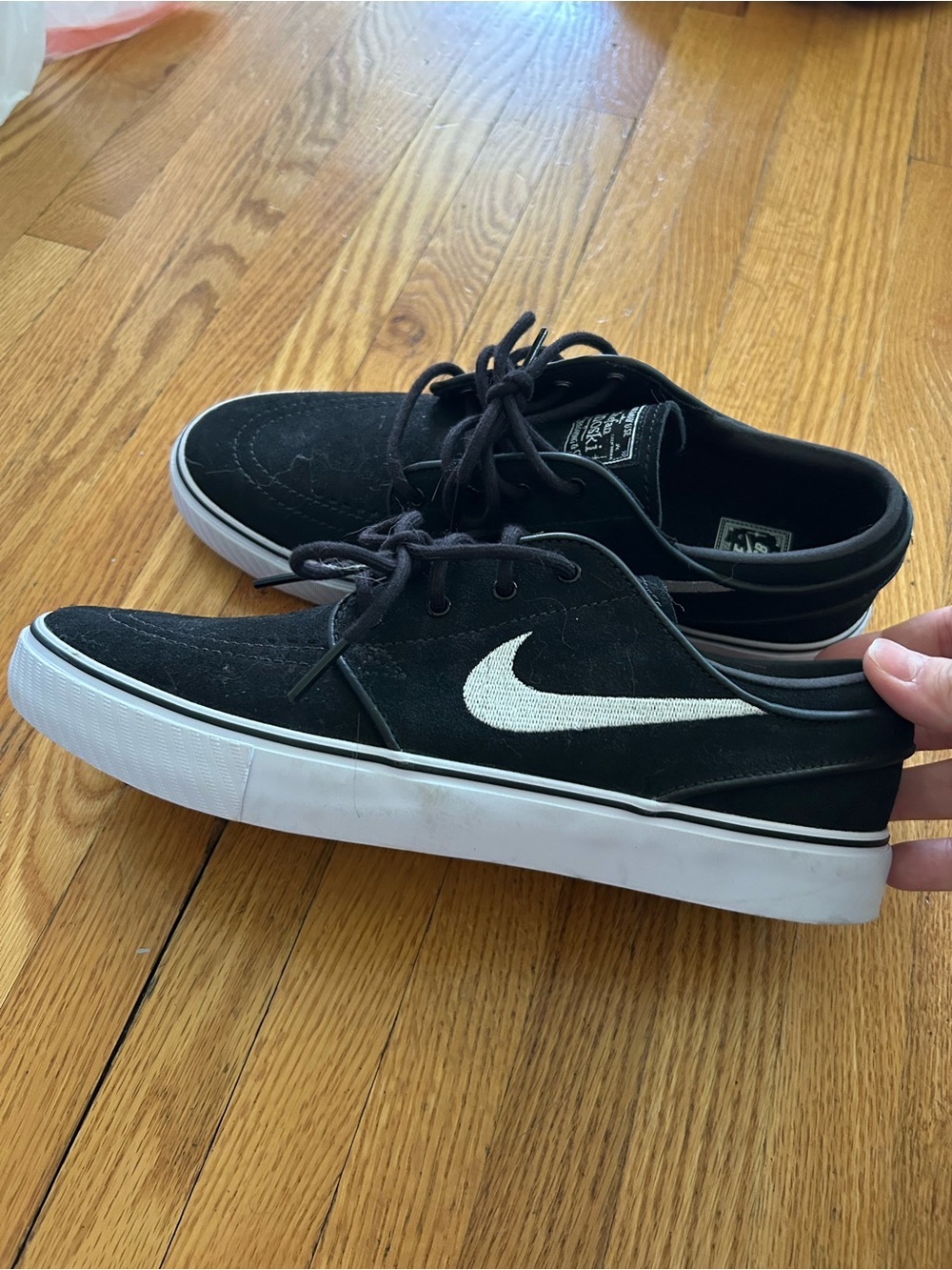 Nike Black Suede Sneakers with White Swoosh